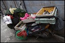 Selling fish in a Shanghai alley.