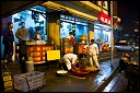 Preparing food on the street, Shanghai, China.