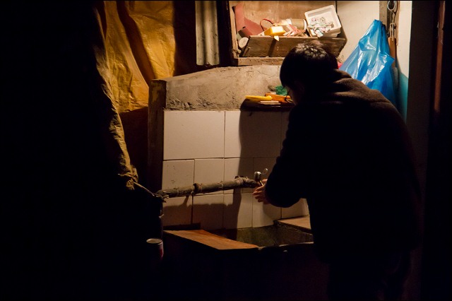 Washing outside an apartment in an alley, Shanghai, China.