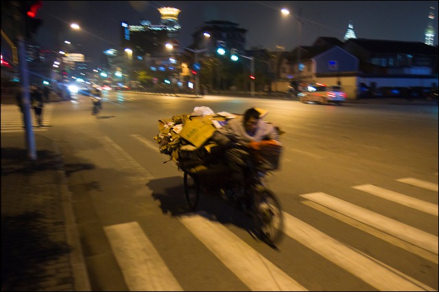 Riding on the night streets of Shanghai, China.