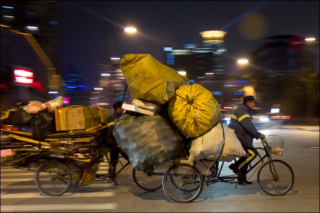 Riding on the night streets of Shanghai, China.