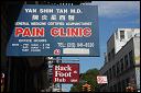 Pain and stress relief offered on Mott Street. Chinatown, NYC.