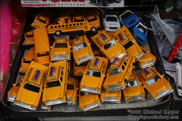 Display of toy taxis for sale. Chinatown, NYC.