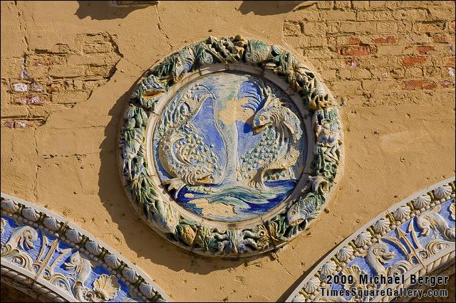 Rondel modeled by Maxfield H. Keck depicting a pair of fish swimming in the rough ocean waters. Childs Retaurant, Coney Island, Brooklyn, NY. Built 1923.