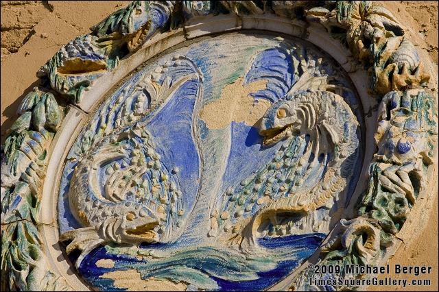 Rondel modeled by Maxfield H. Keck depicting a pair of fish swimming in the rough ocean waters. Childs Retaurant, Coney Island, Brooklyn, NY. Built 1923.