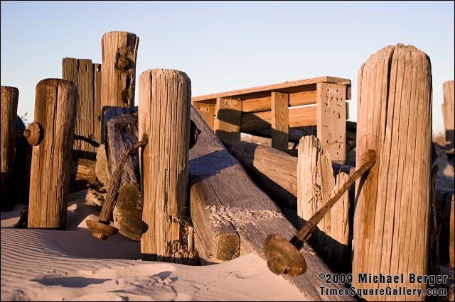 Remains of old pier dividing the beach.  Fort Tilden, NY.
