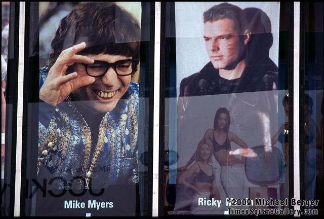 Posters in the window of the MTV TRL Studio in Times Square. 1999.