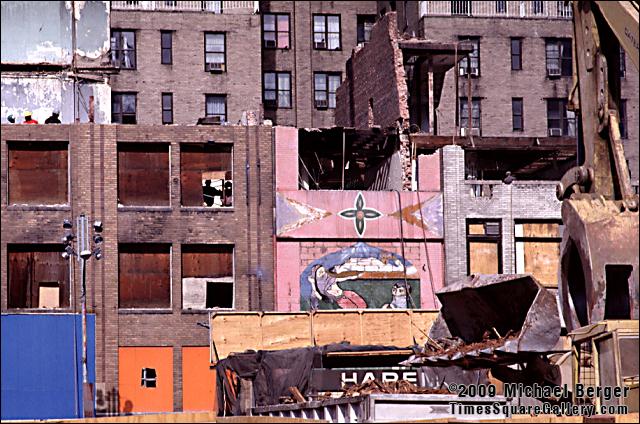 Building demolition in progress on the north side of West 42nd Street between 7th and 8th Avenue. 1997.