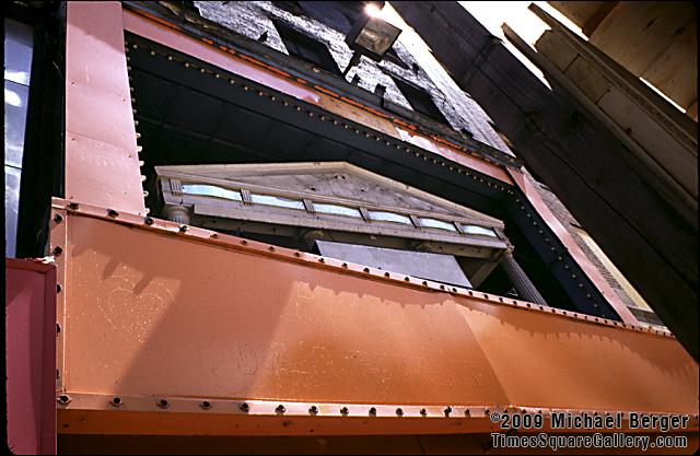 Above the entrance to a Greek themed theatre on the north side of West 42nd Street between 7th and 8th Avenue. 1997.